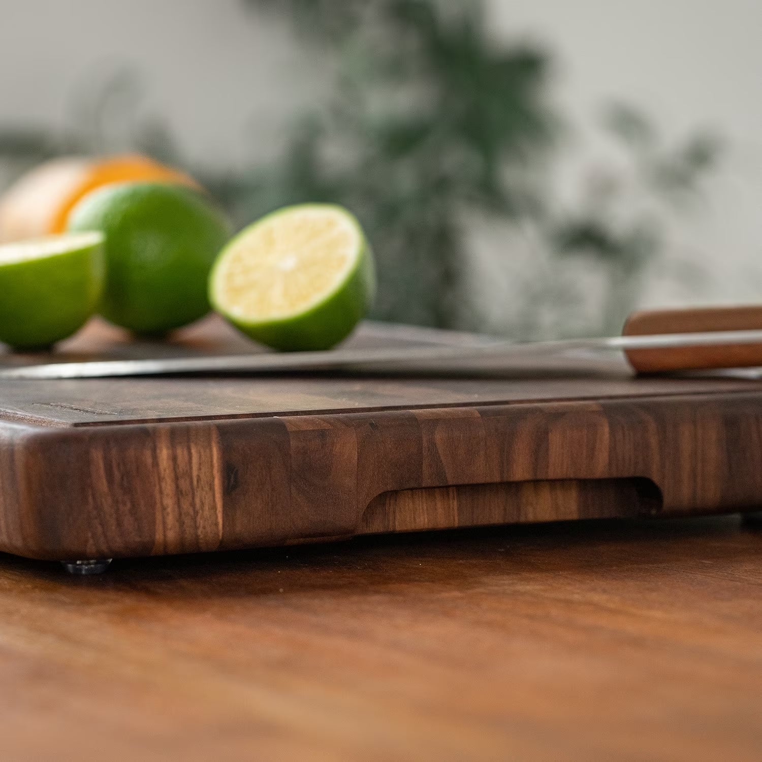 Muso Wood Walnut Wood Checkered Cutting Board with Feet 16 X 12 In